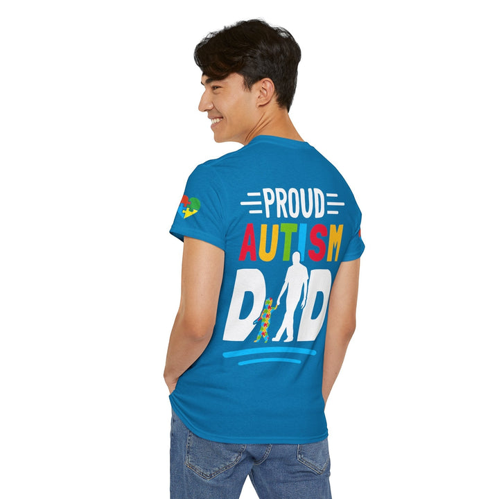 Sea Dragon Dreams blue heavy cotton t-shirt with Proud Autism Dad graphic on the back, worn by a man from behind.