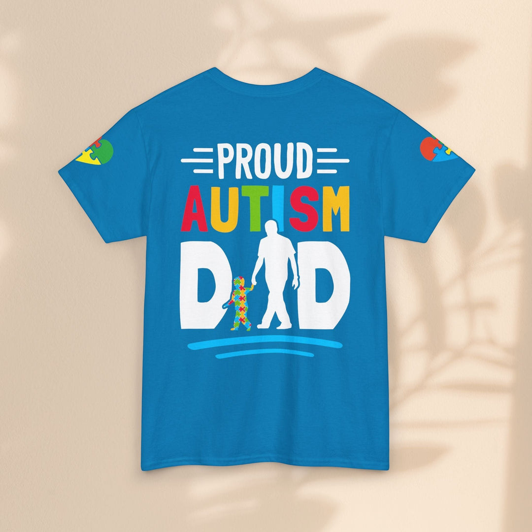 Sea Dragon Dreams blue heavy cotton t-shirt with Proud Autism Dad graphic and colorful puzzle piece design.