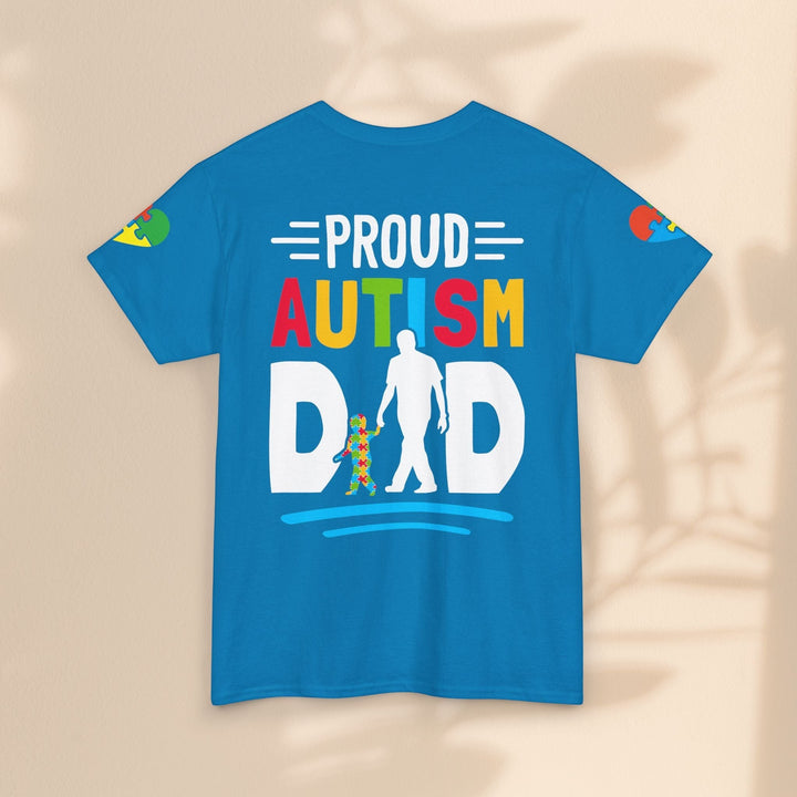 Sea Dragon Dreams blue heavy cotton t-shirt with Proud Autism Dad graphic and colorful puzzle piece design.