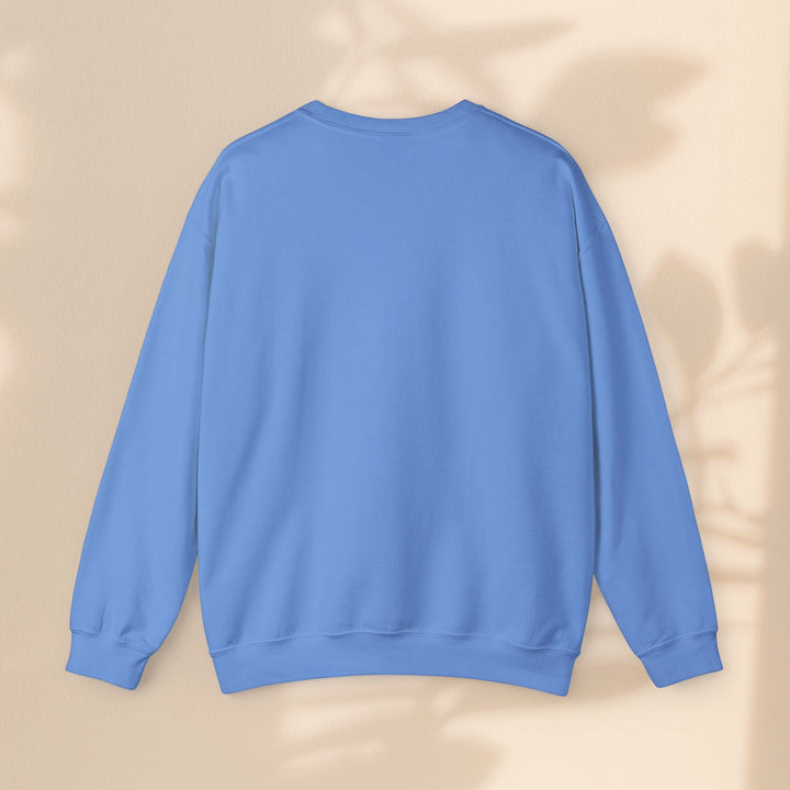 Sea Dragon Dreams unisex blue crewneck sweatshirt, back view, made from a durable cotton and polyester blend.