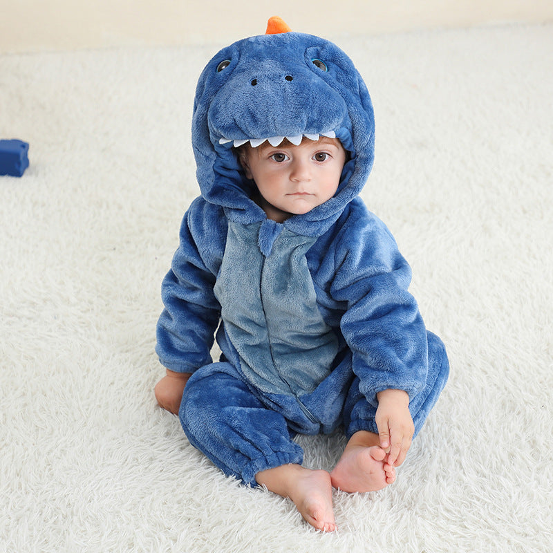 Sea Dragon Dreams blue dragon hooded flannel onesie worn by a toddler sitting on a white rug