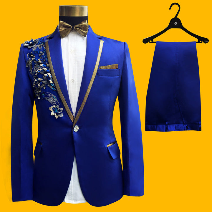Sea Dragon Dreams four-piece blue tuxedo suit with intricate floral embroidery, gold lapels, and matching trousers.