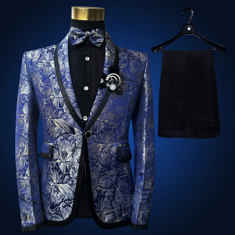 Sea Dragon Dreams four-piece tuxedo suit featuring a blue floral embroidered blazer with black lapels and bowtie.