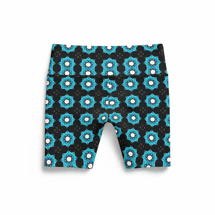Sea Dragon Dreams women's workout shorts featuring a vibrant blue floral geometric pattern on black polyester fabric.