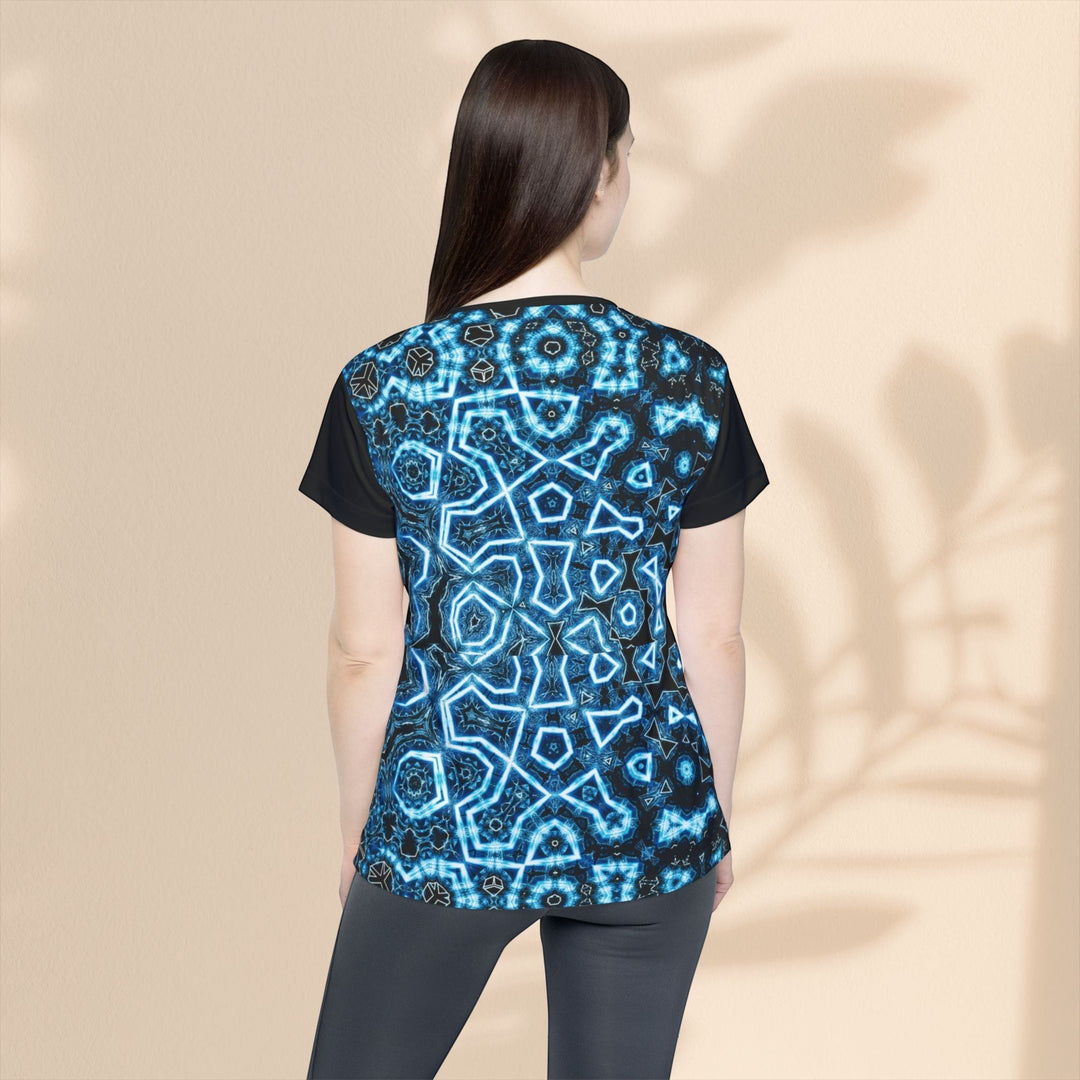 Sea Dragon Dreams women's sports jersey with a blue geometric pattern, moisture-wicking polyester, back view.