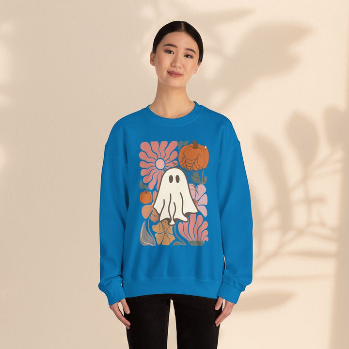 Sea Dragon Dreams unisex blue crewneck sweatshirt featuring a retro ghost, pumpkin, and floral graphic print.
