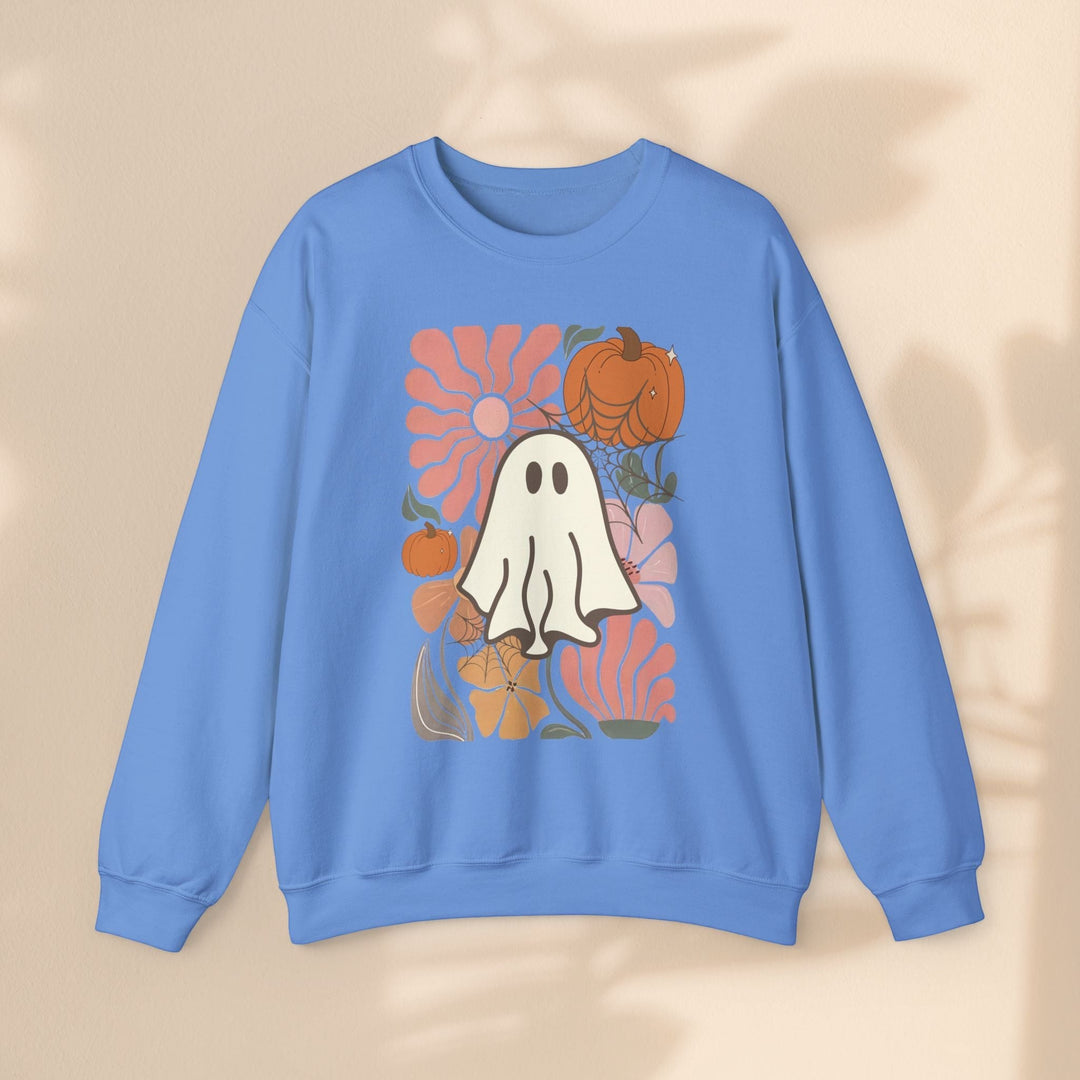 Sea Dragon Dreams blue crewneck sweatshirt featuring a retro ghost, pumpkin, and floral graphic print.