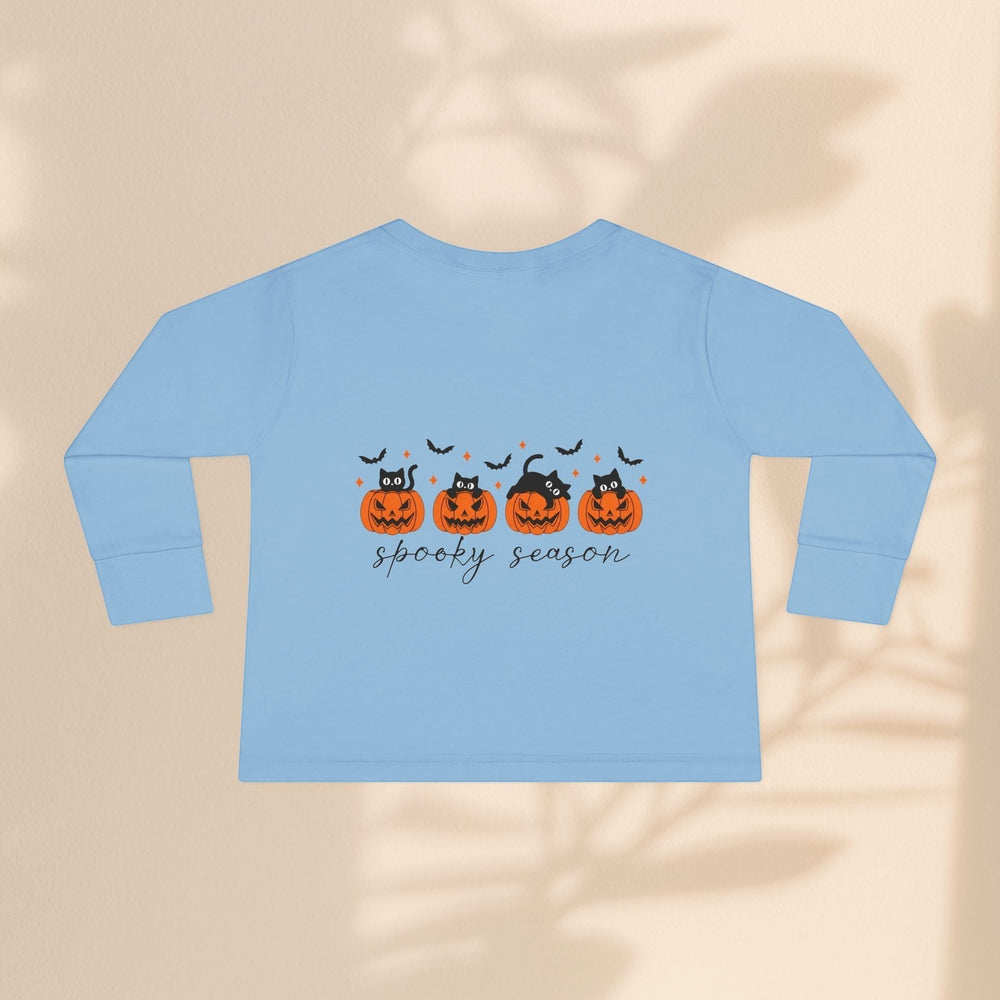 Sea Dragon Dreams light blue toddler long sleeve tee with a spooky season pumpkin and black cat Halloween graphic