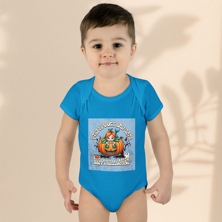 Sea Dragon Dreams infant bodysuit in blue with a Stay Spooky and Cute pumpkin graphic for Halloween.