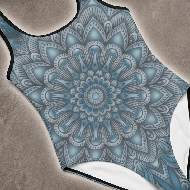 Sea Dragon Dreams one-piece swimsuit featuring a blue mandala pattern, U-shape neckline, and supportive elastic straps.