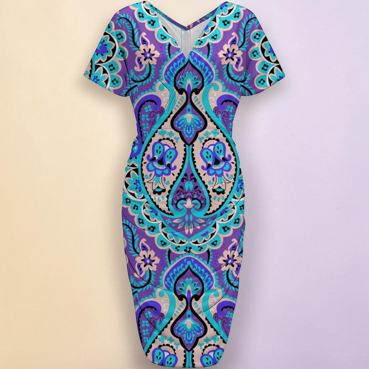 Sea Dragon Dreams blue V-neck dress with a vibrant paisley magic print and side pleated details in polyester fabric.