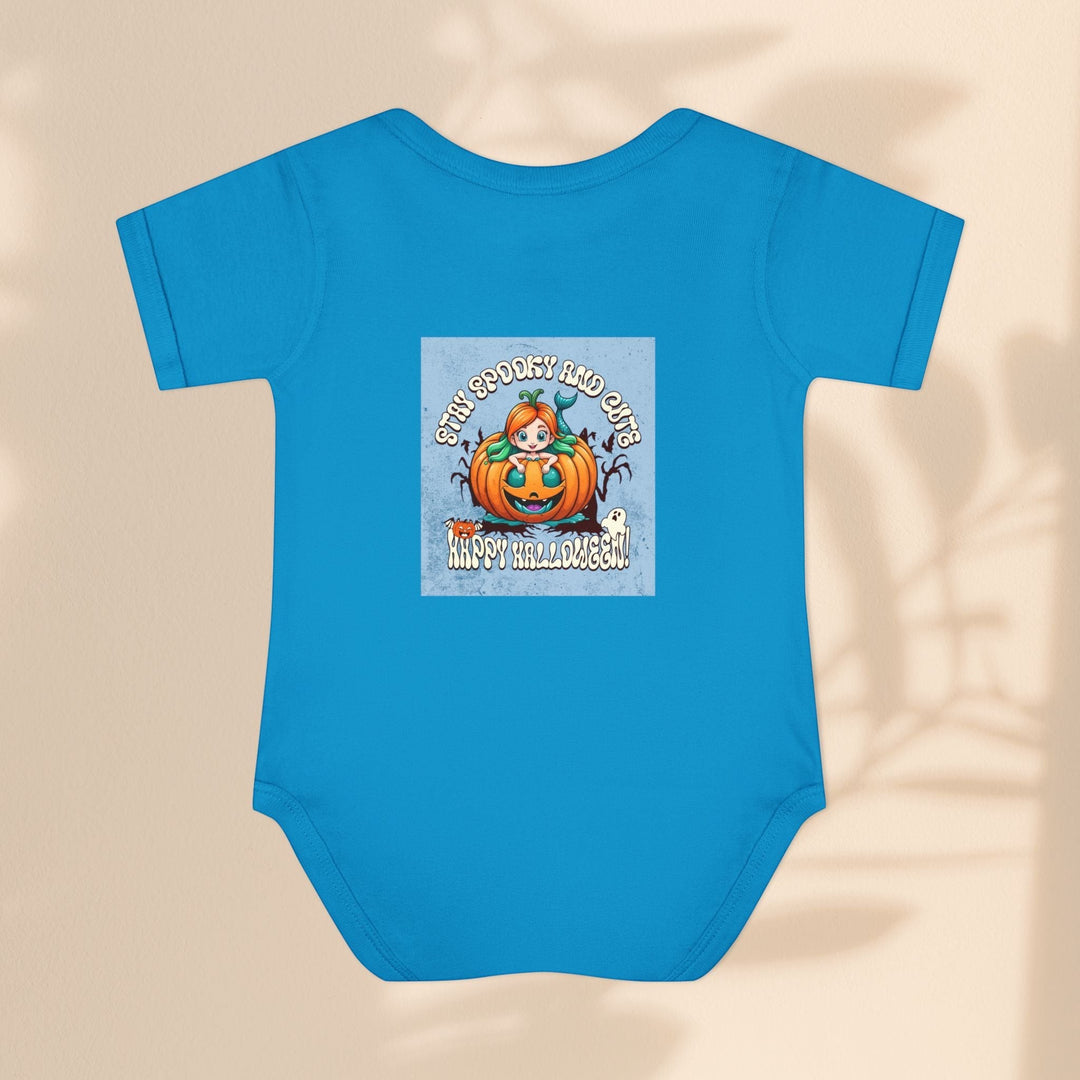 Sea Dragon Dreams infant bodysuit in blue cotton with a Stay Spooky and Cute pumpkin Halloween graphic print