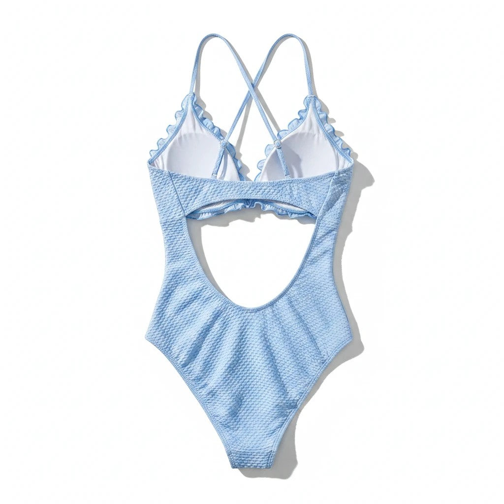 Sea Dragon Dreams light blue textured bikini with ruffle trim, lace-up back, and push-up top, back view.