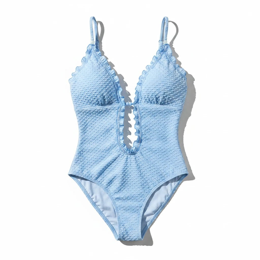 Sea Dragon Dreams light blue textured one-piece swimsuit with ruffle trim and lace-up front detail.