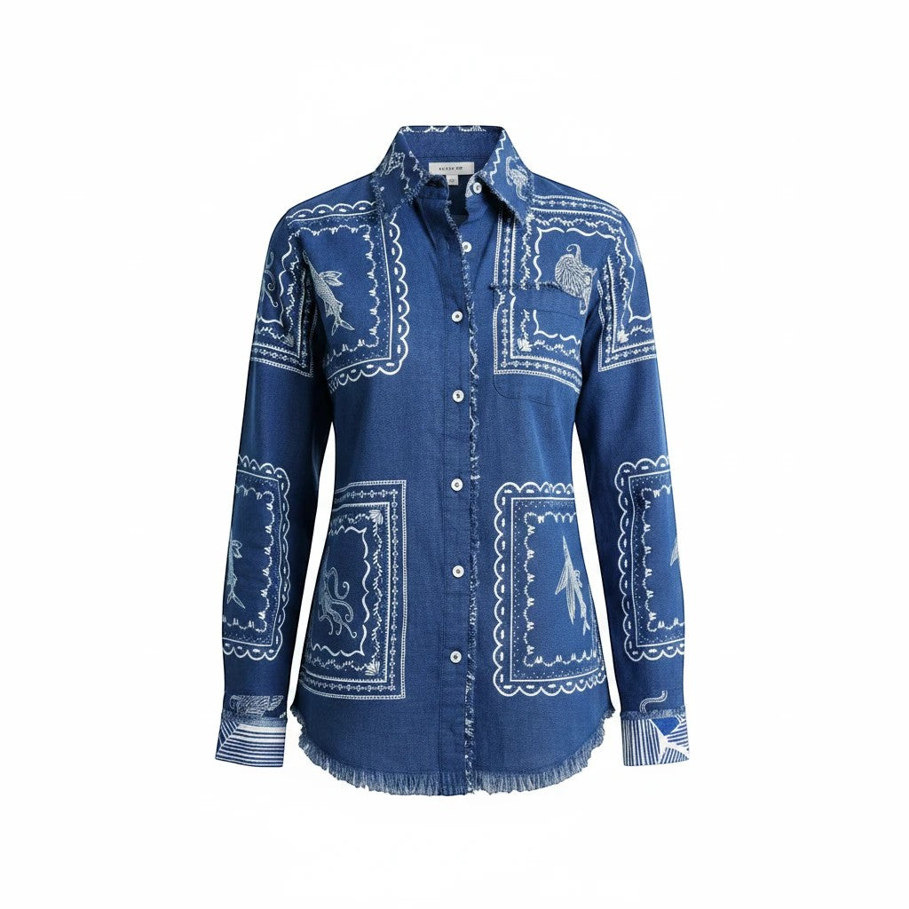 Sea Dragon Dreams blue long-sleeve blouse with white nautical sealife print, button-down front, and frayed hem.