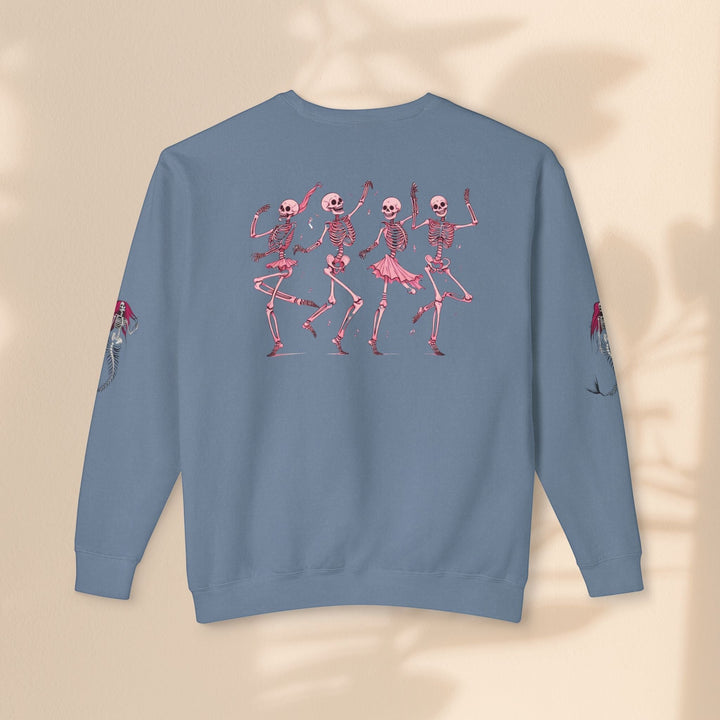 Sea Dragon Dreams blue crewneck sweatshirt featuring a back print of dancing pink skeletons and mermaid sleeve art.