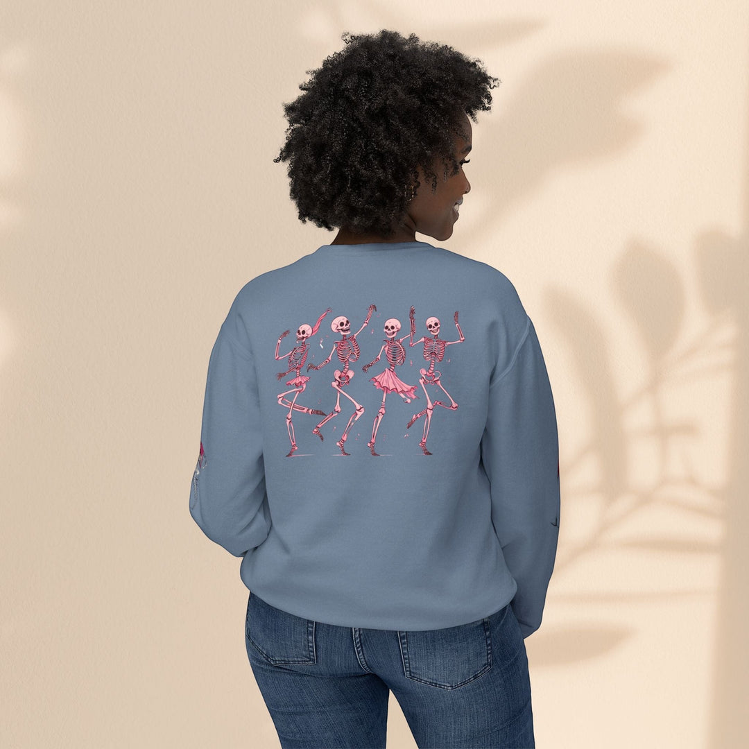 Sea Dragon Dreams blue crewneck sweatshirt featuring a back print of four dancing pink skeletons in a relaxed fit