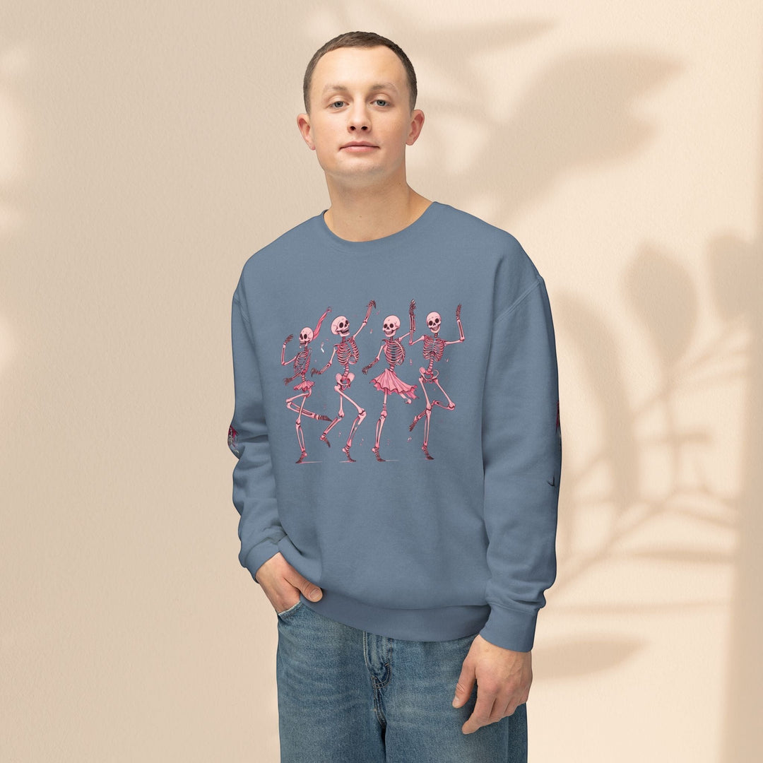 Sea Dragon Dreams blue crewneck sweatshirt featuring a pink dancing skeletons graphic, worn by a man in jeans.