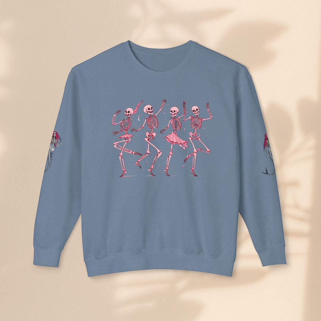 Sea Dragon Dreams blue crewneck sweatshirt featuring a pink dancing skeletons graphic and mermaid sleeve details.
