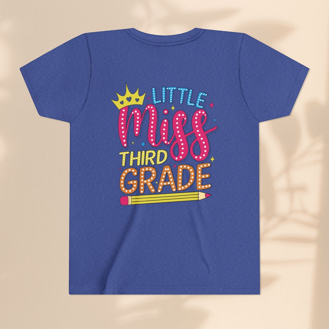 Sea Dragon Dreams blue youth t-shirt with Little Miss Third Grade graphic, crown, and pencil design.