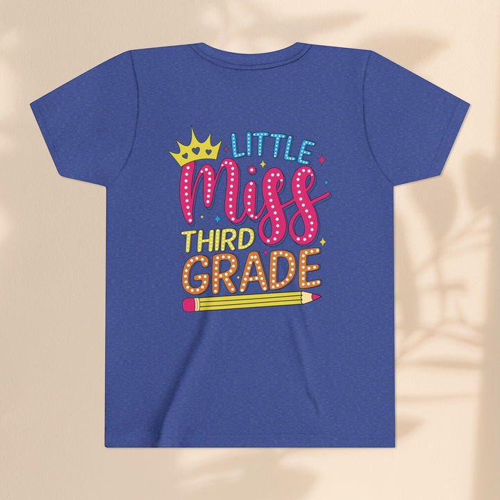 Sea Dragon Dreams blue youth t-shirt with Little Miss Third Grade graphic, crown, and pencil design.