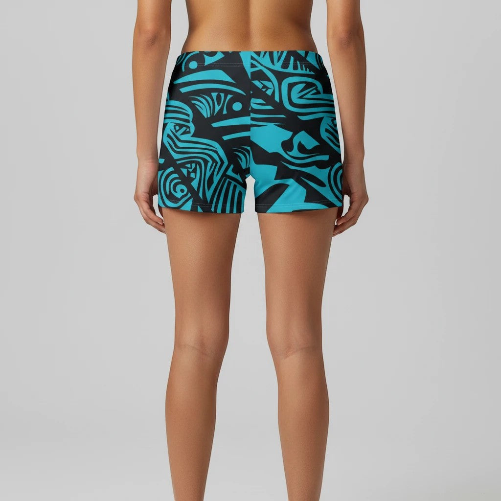 Sea Dragon Dreams women's skinny fit shorts in blue with a vibrant tribal print, made from moisture-wicking fabric.