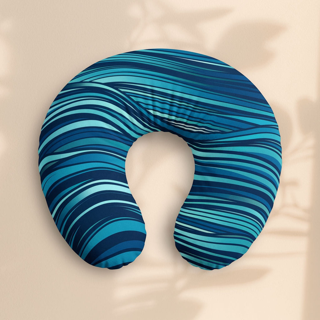 Sea Dragon Dreams nursing pillow cover in a blue ocean wave stripe pattern made from soft, stretchy jersey knit.