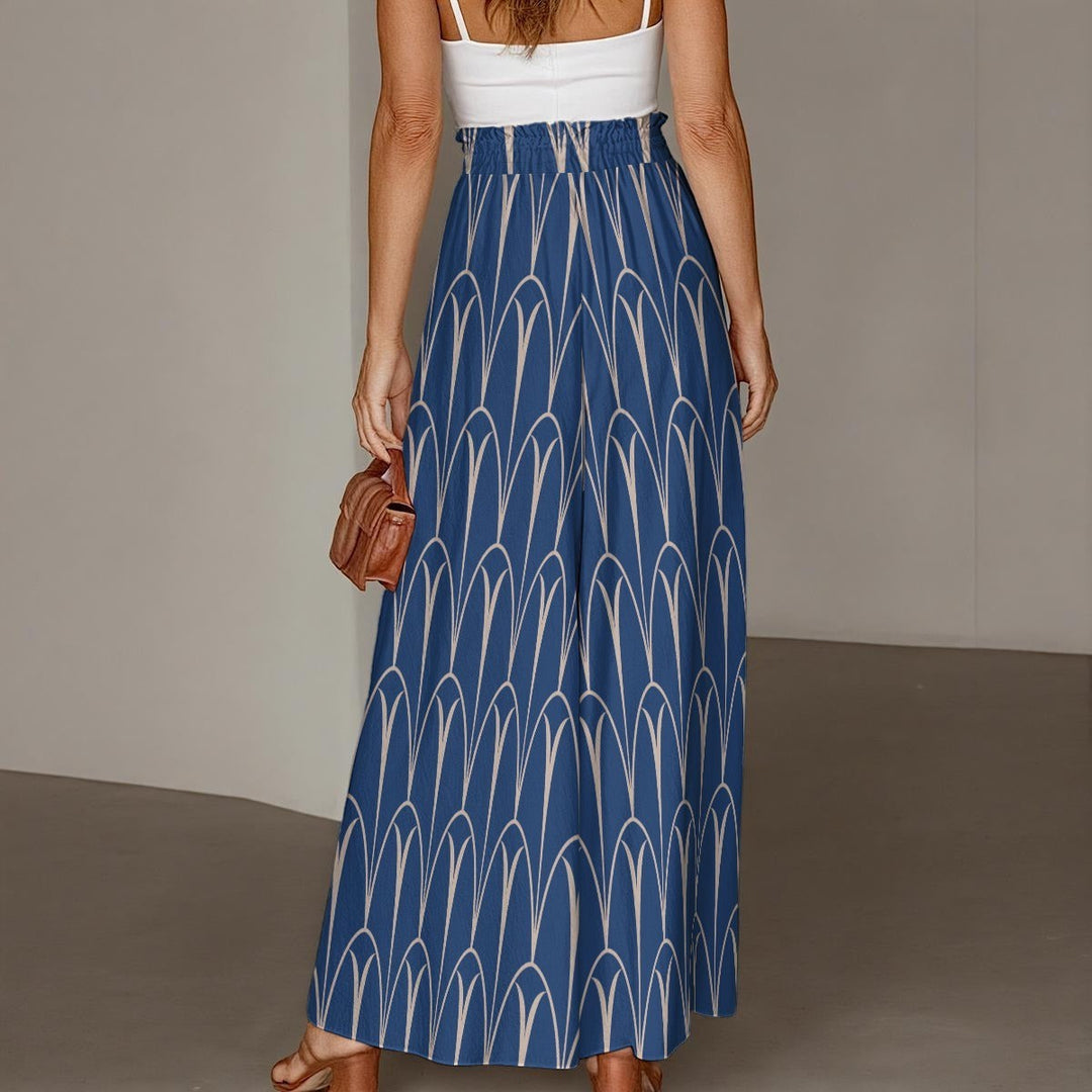 Sea Dragon Dreams blue wide-leg pants with a white geometric arch pattern, featuring an elasticated drawstring waist.