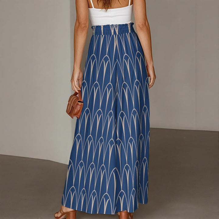 Sea Dragon Dreams blue wide-leg pants with a white geometric arch pattern, featuring an elasticated drawstring waist.