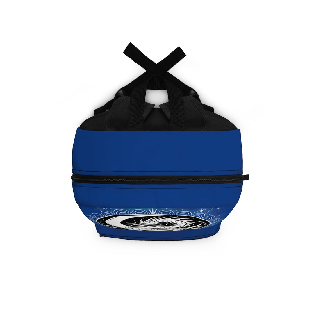 Sea Dragon Dreams backpack featuring a blue exterior and a yin yang dragon graphic on the bottom compartment.
