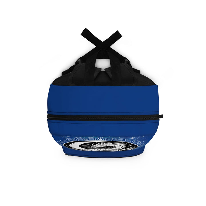 Sea Dragon Dreams backpack featuring a blue exterior and a yin yang dragon graphic on the bottom compartment.