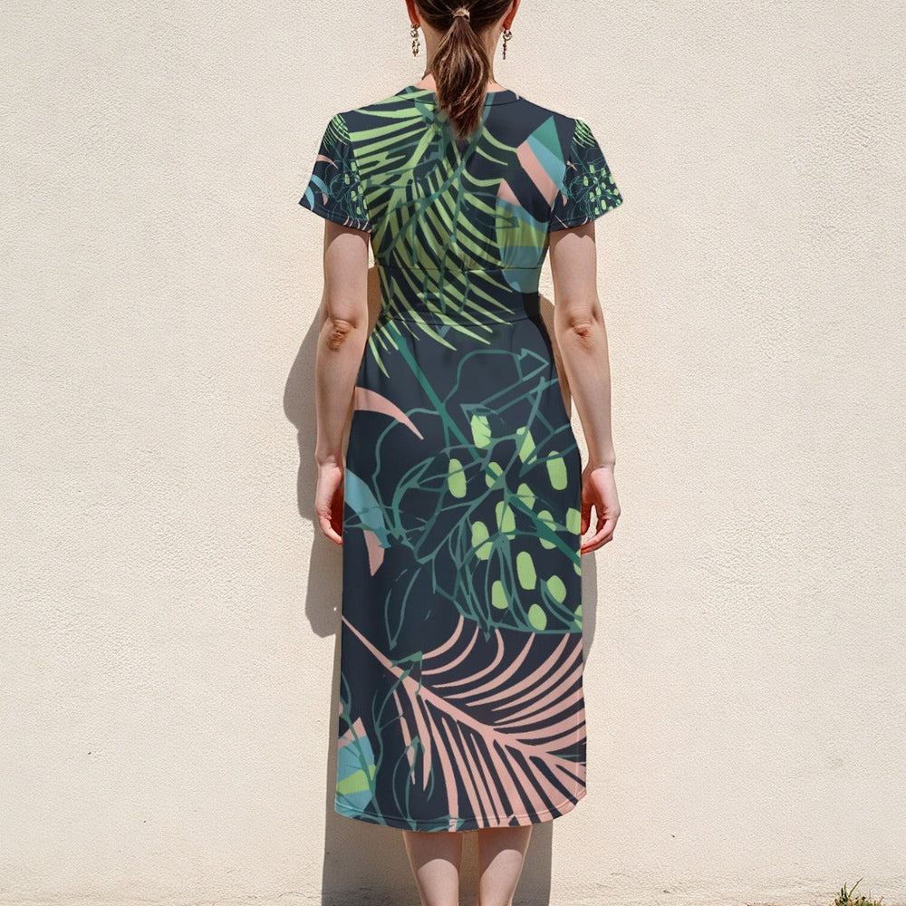 Sea Dragon Dreams botanical print midi dress with flutter sleeves and a V-neck, shown from the back.