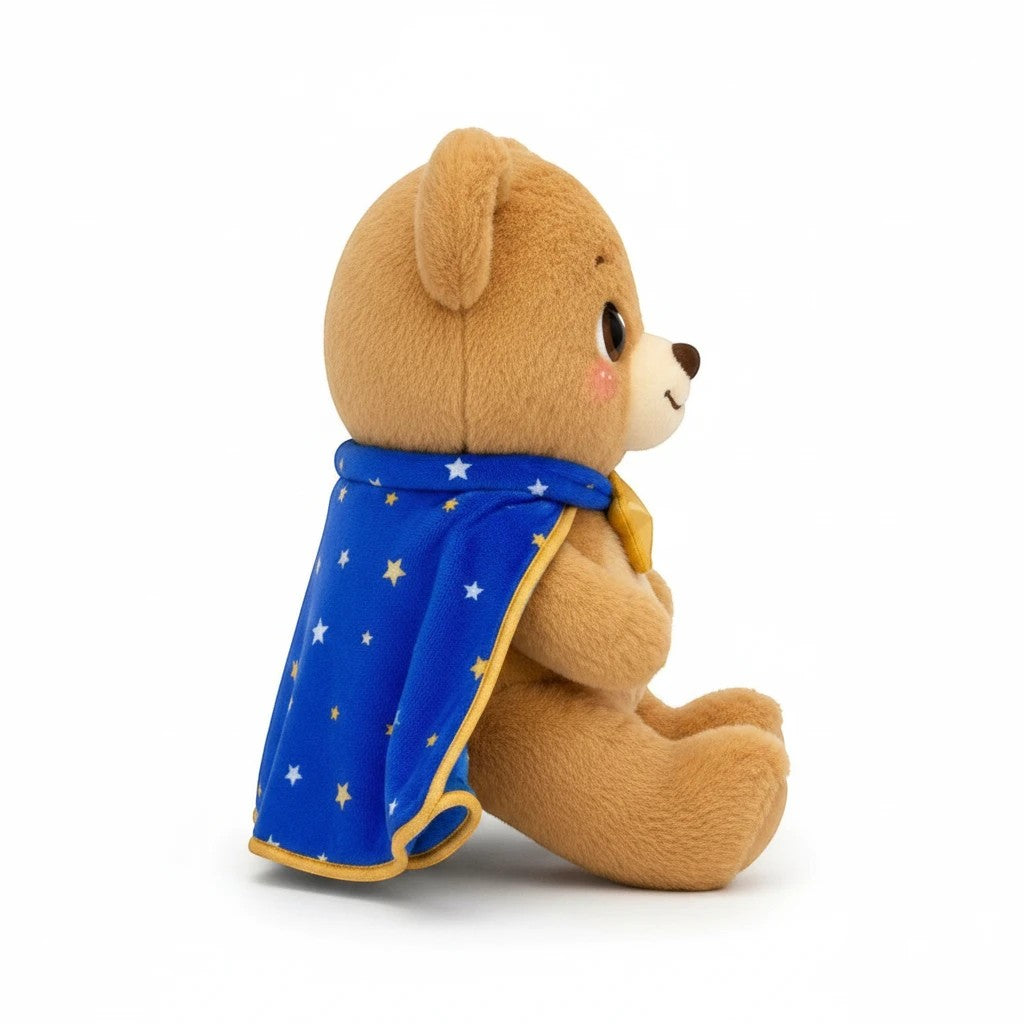 Sea Dragon Dreams Brave Buddies Bear plush toy wearing a blue cape with yellow stars, side view on white background