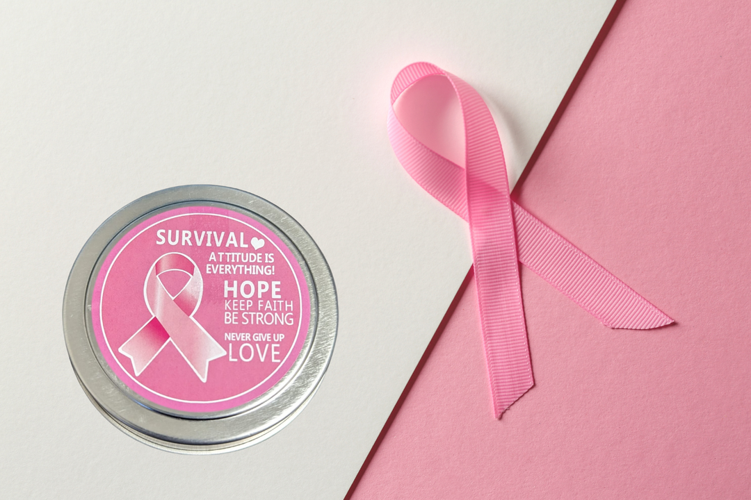 Sea Dragon Dreams breast cancer awareness gift tin with pink ribbon on a soft pink and white background