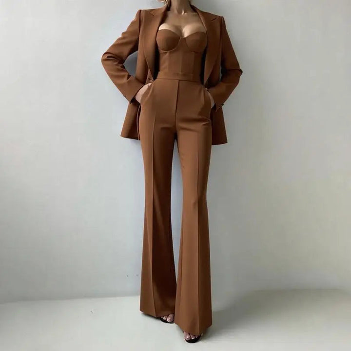 Sea Dragon Dreams brown 3-piece pantsuit featuring a tailored blazer, corset bustier top, and straight-leg trousers.