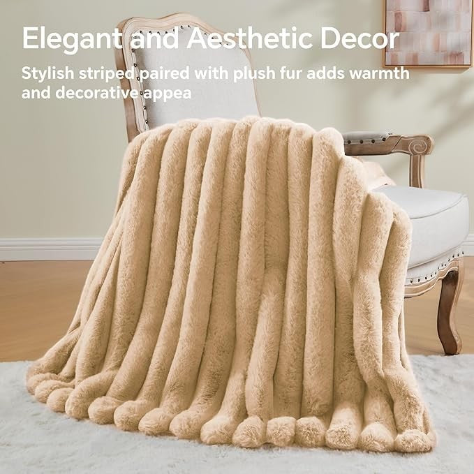 Sea Dragon Dreams BEDELITE brown faux rabbit fur throw blanket with 3D striped texture draped over a vintage chair.