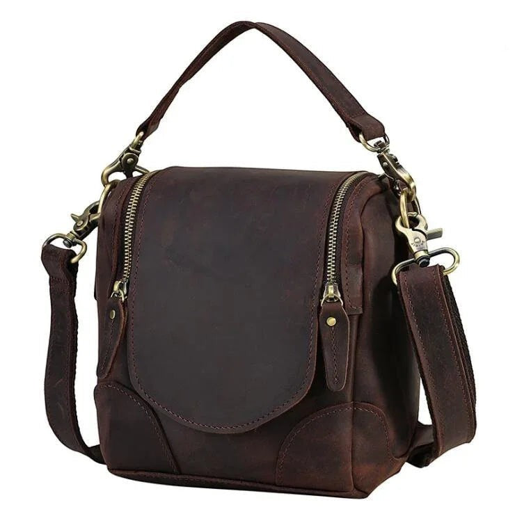 Sea Dragon Dreams Calista handcrafted dark brown full-grain leather camera bag with brass hardware and top handle.