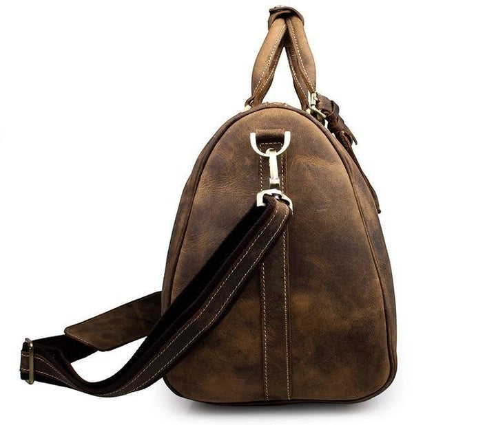 Sea Dragon Dreams Brandt Weekender brown horse leather duffle bag side view with shoulder strap attachment