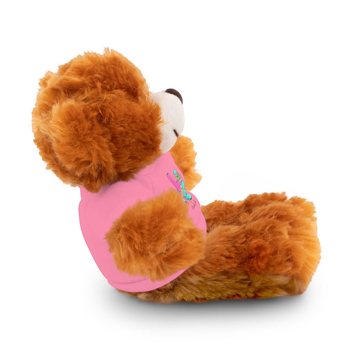 Sea Dragon Dreams brown plush bear wearing a pink cotton t-shirt with Love Teacher Life graphic, side view