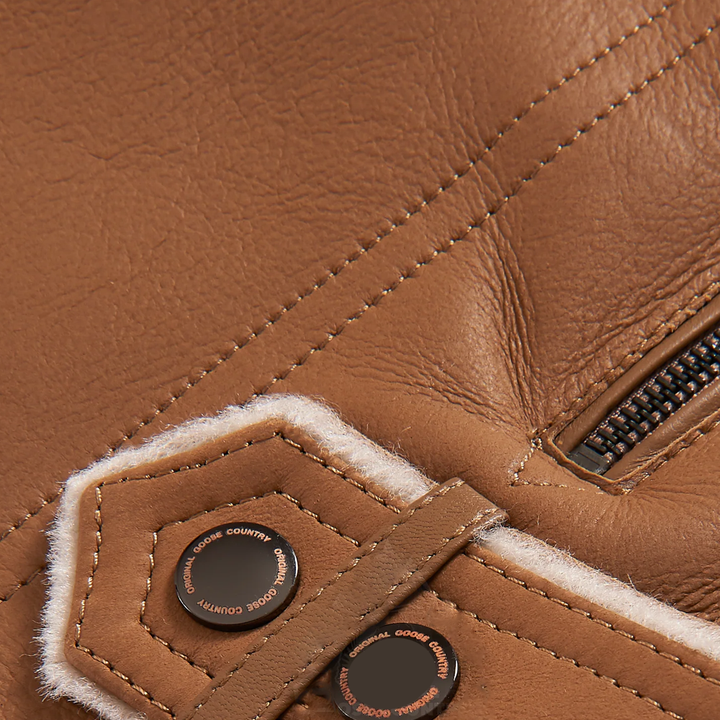 Sea Dragon Dreams brown B3 sheepskin shearling aviator jacket detail with leather texture and metal buttons