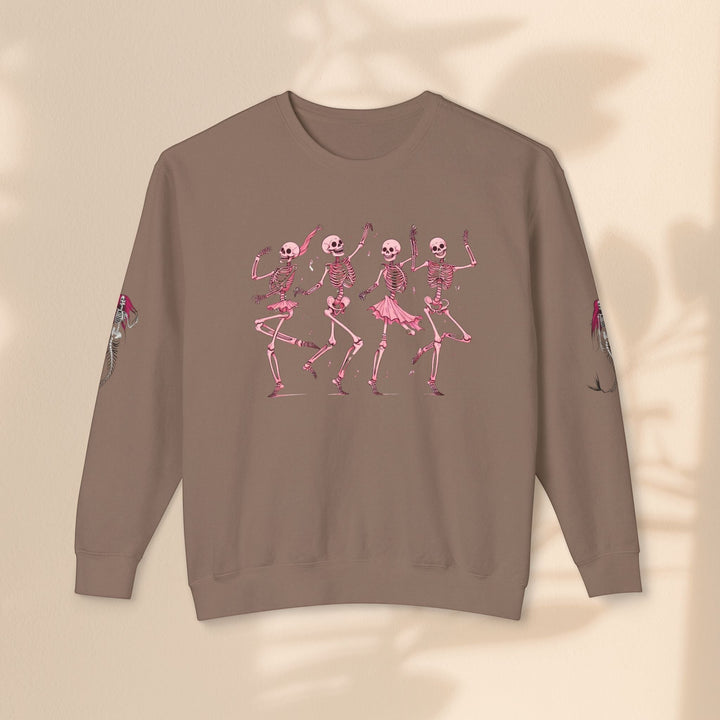 Sea Dragon Dreams brown crewneck sweatshirt featuring a pink dancing skeletons graphic on the front and sleeves.