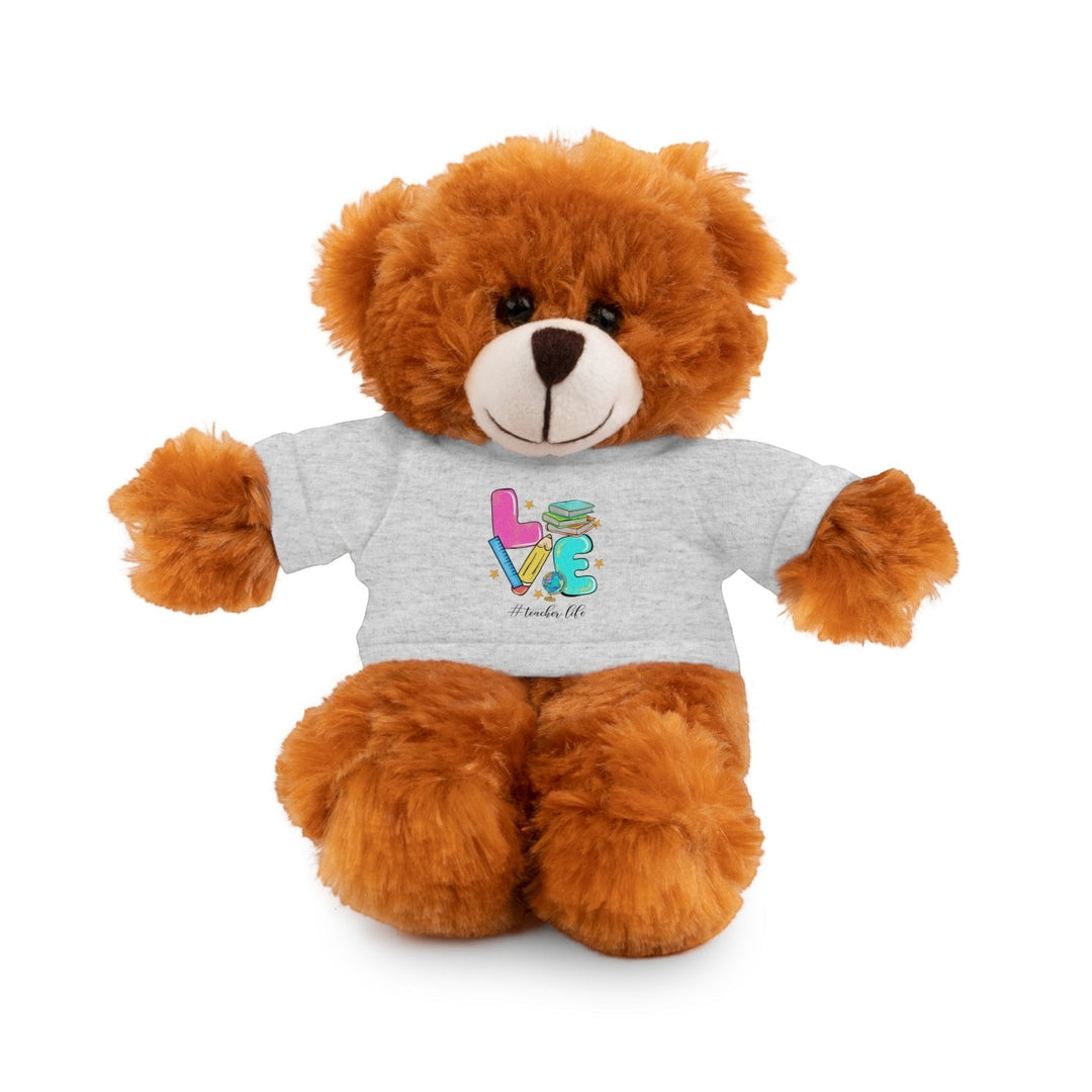 Sea Dragon Dreams brown plush teddy bear wearing a grey cotton t-shirt with a Love Teacher Life graphic print.