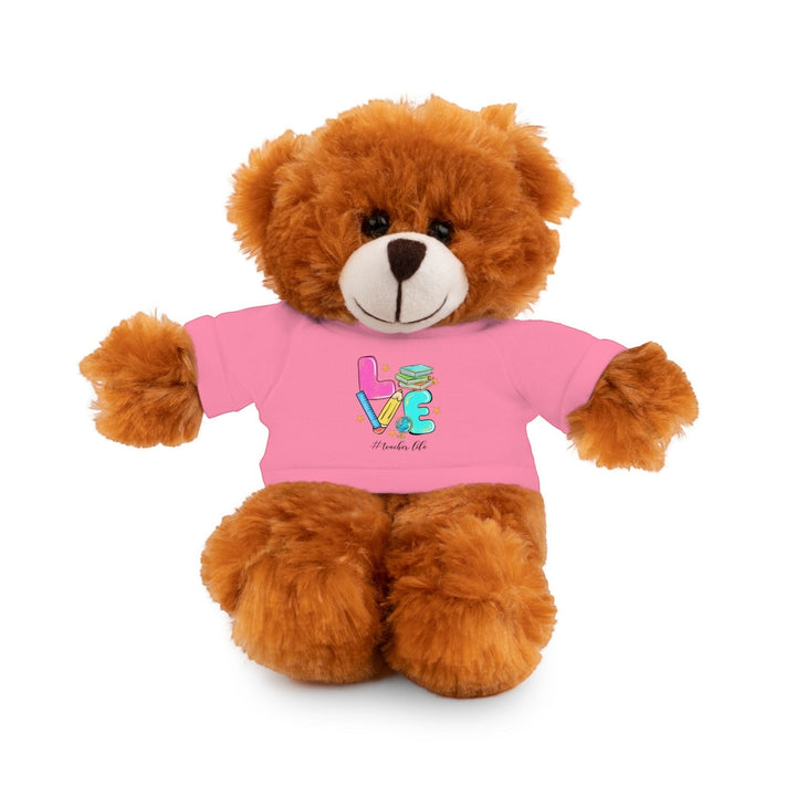 Sea Dragon Dreams brown plush teddy bear wearing a pink cotton t-shirt with a Love Teacher Life graphic design.