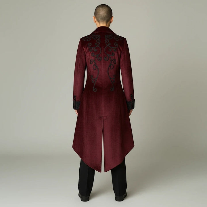 Sea Dragon Dreams men's burgundy Gothic tailcoat with black embroidery on the back, worn by a model, rear view.