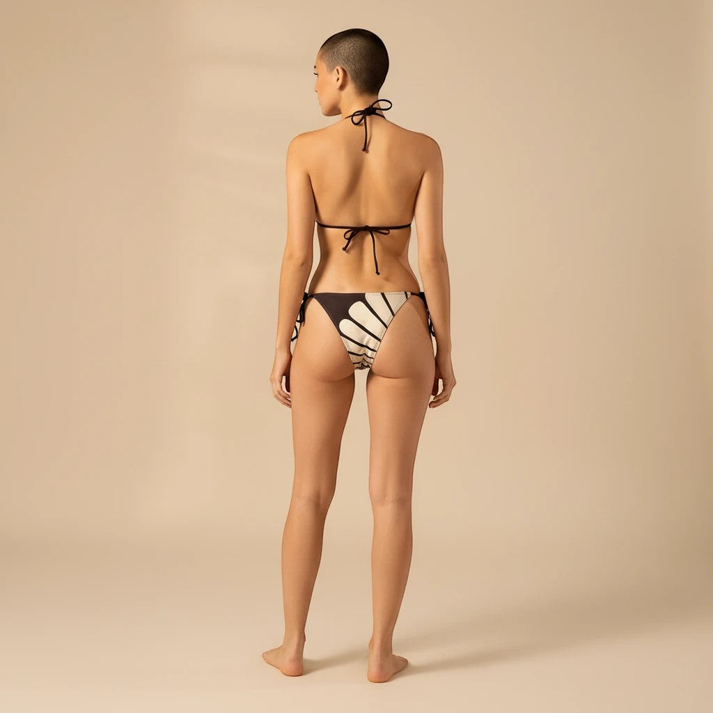 Sea Dragon Dreams butterfly bikini set with T-back top and side-tie bottoms on a model, back view.