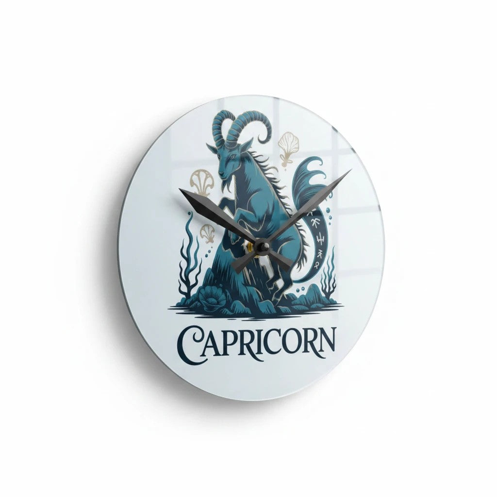 Sea Dragon Dreams round acrylic wall clock featuring a teal Capricorn sea-goat illustration on a white background.