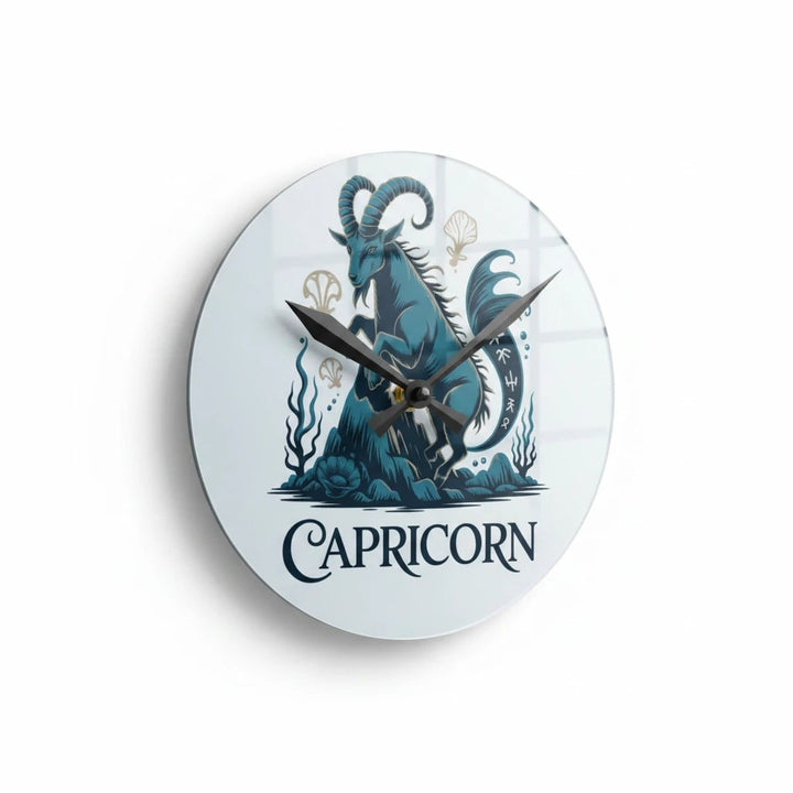 Sea Dragon Dreams round acrylic wall clock featuring a teal Capricorn sea-goat illustration on a white background.
