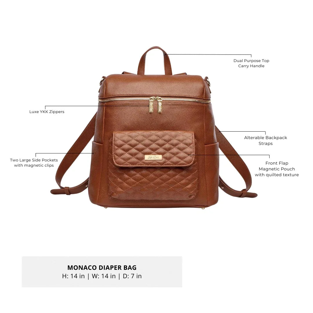 Sea Dragon Dreams Signature diaper bag in caramel brown vegan leather with quilted front pocket and gold zippers