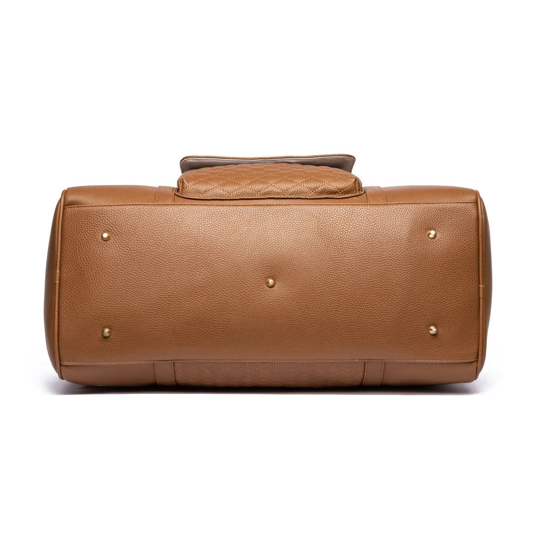 Sea Dragon Dreams caramel vegan leather weekender bag bottom view with gold protective feet and quilted texture