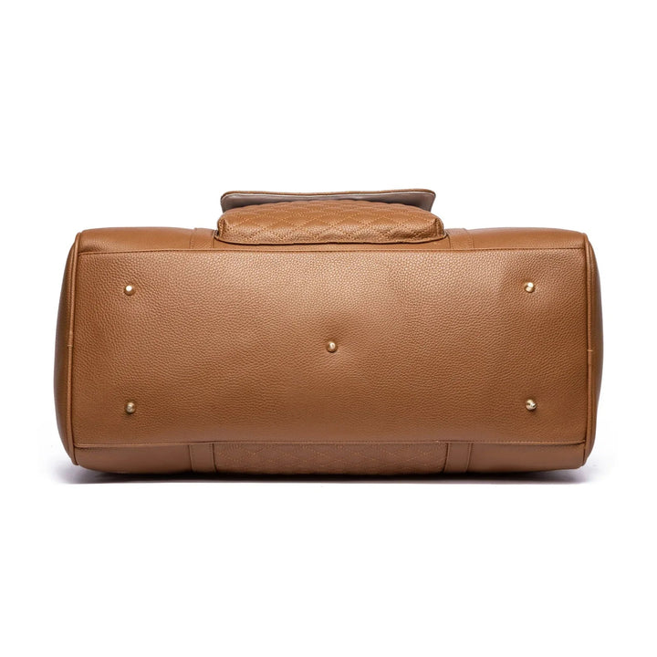 Sea Dragon Dreams caramel vegan leather weekender bag bottom view with gold protective feet and quilted texture